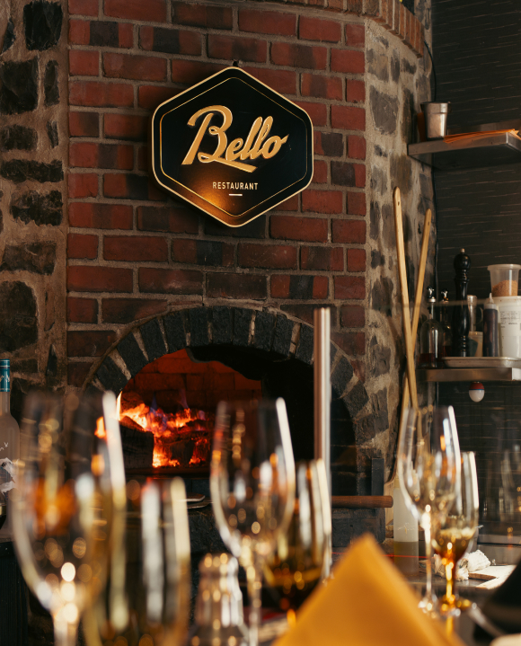 Salle à manger et four à bois au bello